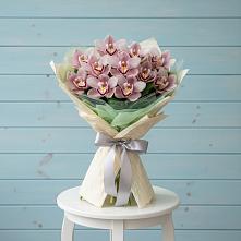 Букет цветов из:  Орхидеи и Розы в Южноуральске